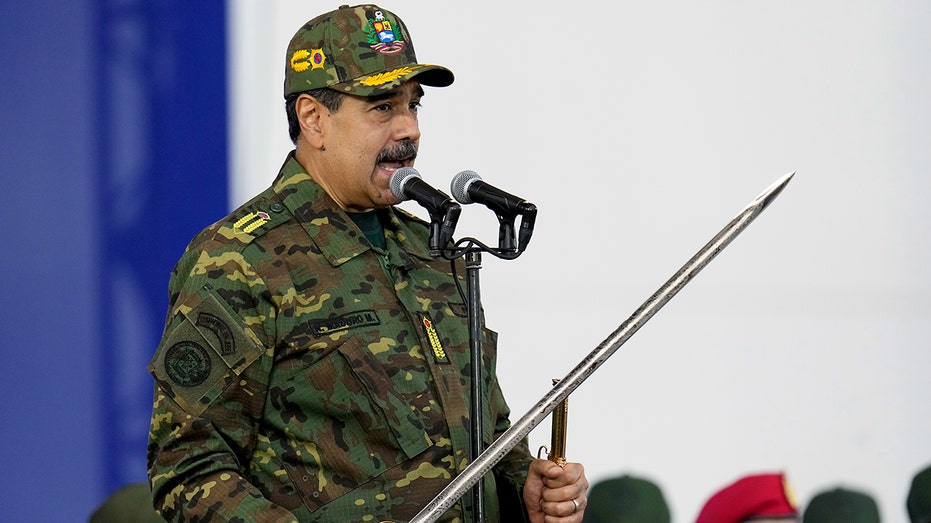 maduro-brandishes-sword-at-rally-as-he-rails-against-‘imperialist-aggression’-amid-rising-tensions-with-us