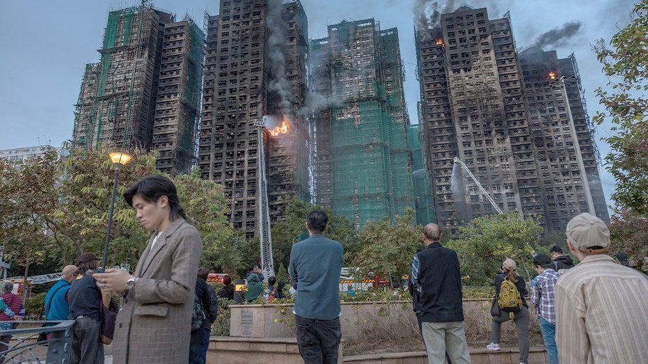 hong-kong-leader-says-‘we-must-uncover-the-truth’-after-deadly-apartment-fire,-calls-for-building-reform